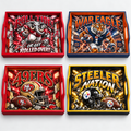 Four sports serving trays showing Alabama, Auburn, San Francisco 49ers, and Pittsburgh Steelers designs